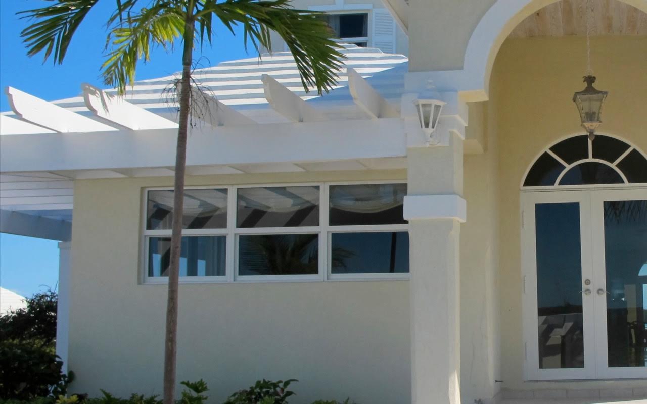 a neat home with premium hurricane impact resistant windows and doors